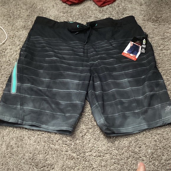 ZeroXposur Black and Gray Swim Shorts with Teal Accents - Picture 1 of 6